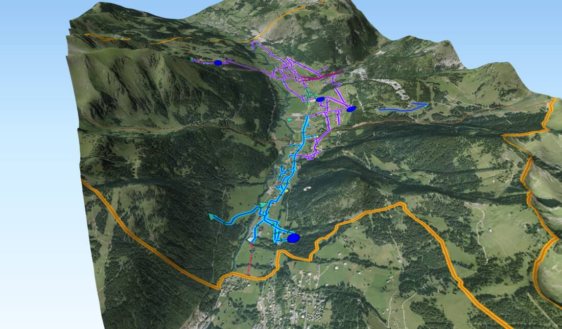 Vue 3D d'un réseau d'eau potable drapé sur un modèle numérique de terrain de vallée alpine